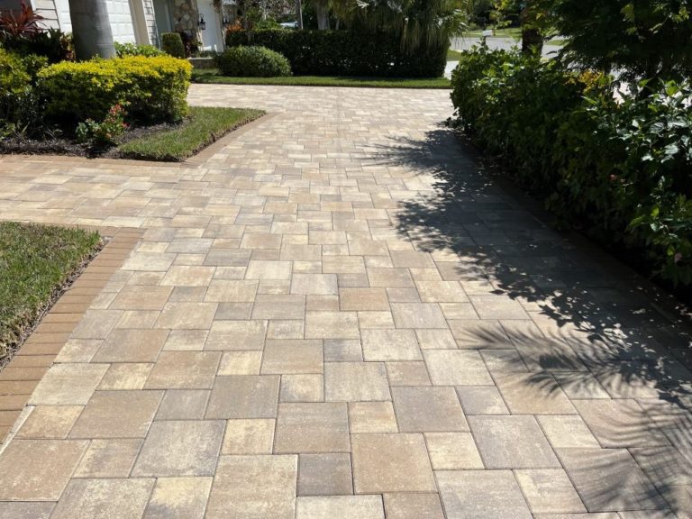 Picture showing a house driveway that has been washed.